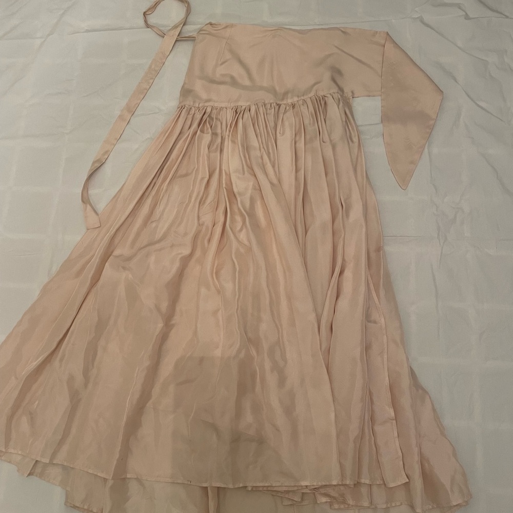 Erika cavalini 100% silk. Light pink wrap skirt